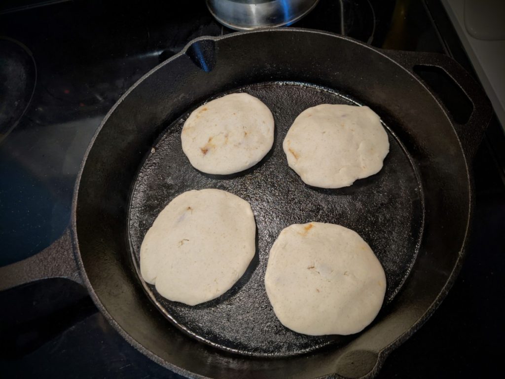 Pupusas on cast iron pan