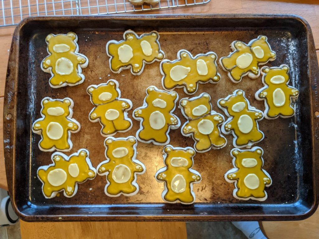 sugar cookies with first step of bear icing