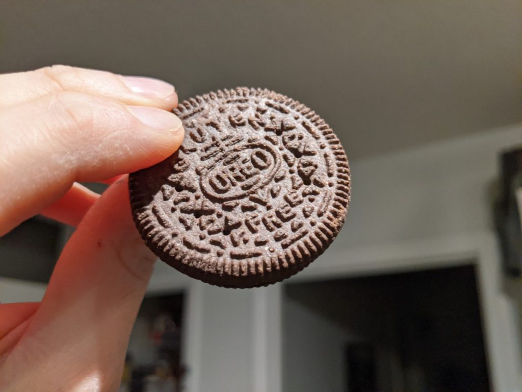 Holding a gluten-free Oreo