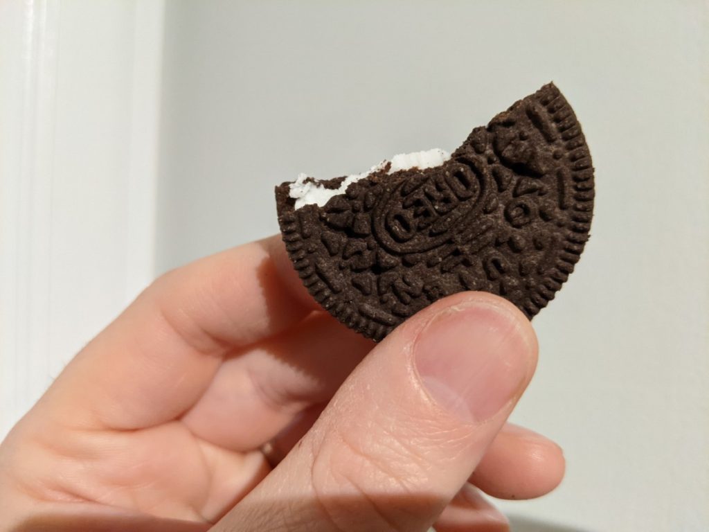 A bitten gluten-free Oreo
