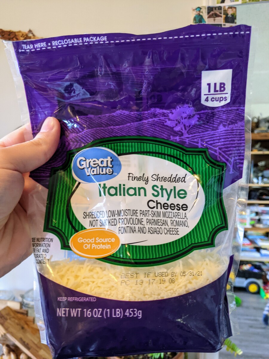 A 1lb bag of Great Value brand Finely Shredded Italian Style Cheese (Shredded low-moisture part-skim mozzarella, not-smoked provolone, parmesan, romano, fontina and asiago cheese)
