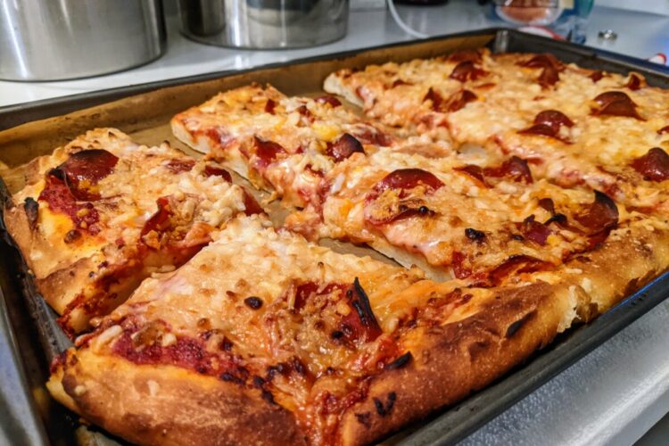 allergy-friendly pizza cooling on baking sheet
