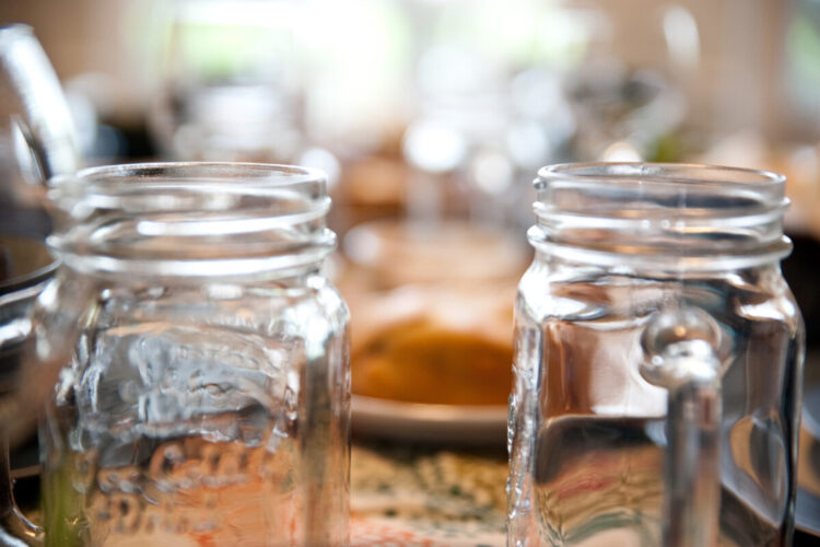 Mason jars at a Thanksgiving dinner table
